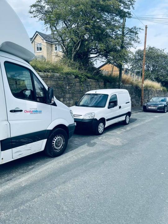 Craig Atkinson Removals Chekatrade-branded van parked on a residential street during a local move.