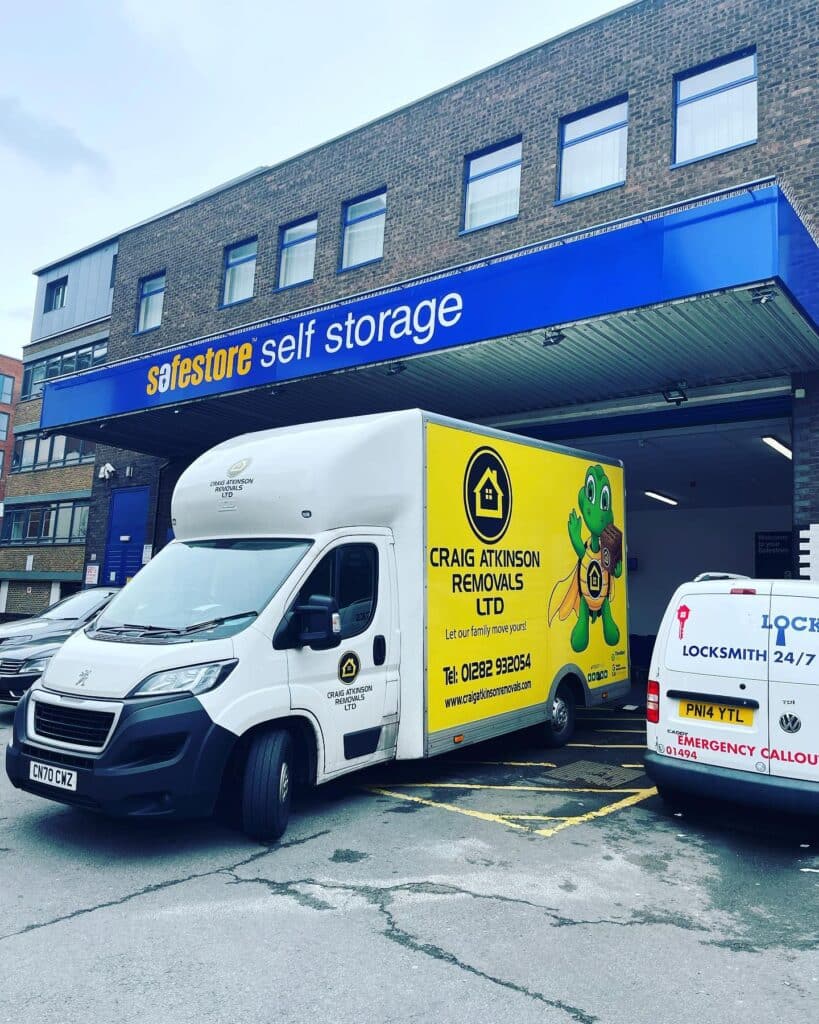 Craig Atkinson Removals van outside Safestore self storage in Colwyn Bay, North Wales