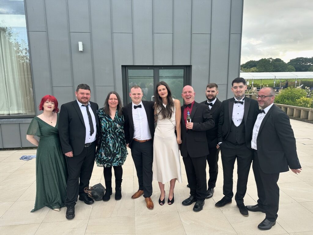 Craig Atkinson Removals team dressed formally at the Burnley Business Awards event
