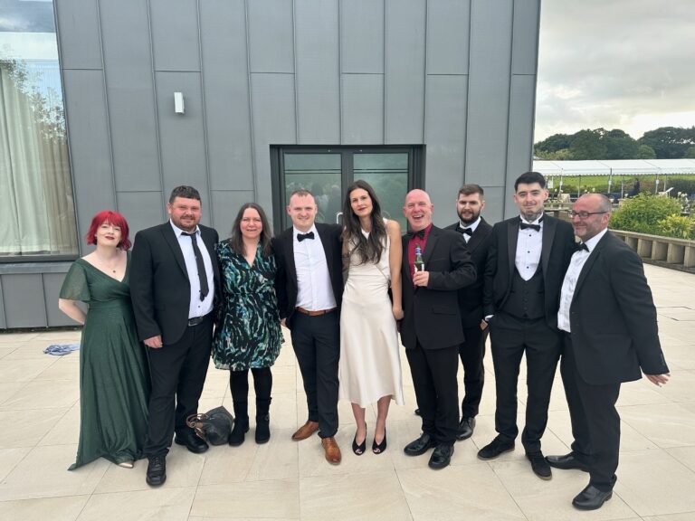 Craig Atkinson Removals team dressed formally at the Burnley Business Awards event
