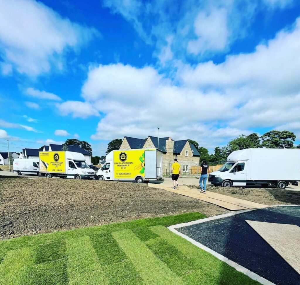 Craig Atkinson Removals vans and team completing a house move in Clitheroe